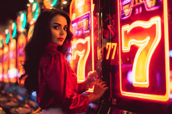 A young woman relaxing with her phone while dynamic casino elements float around her, illustrating the smooth mobile experience offered by the R6R6 app.