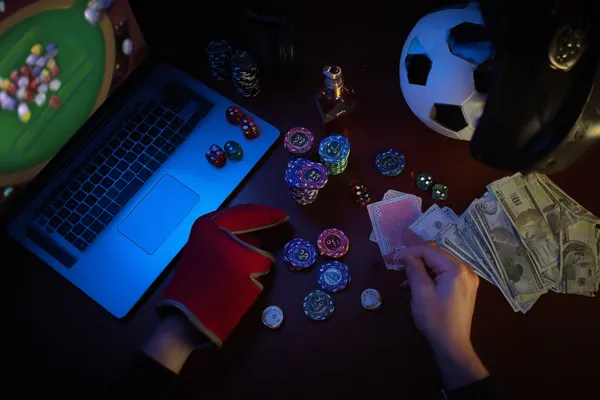 A glowing roulette wheel with cascading chips, symbolizing the engaging live and instant-win games available on R6R6.