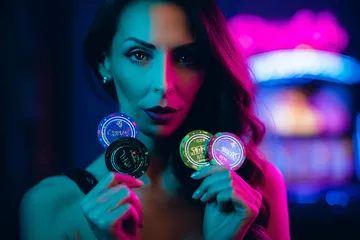 A woman smiling by bright slot machines showing lucky symbols, showcasing the exciting slot offerings at R6R6.